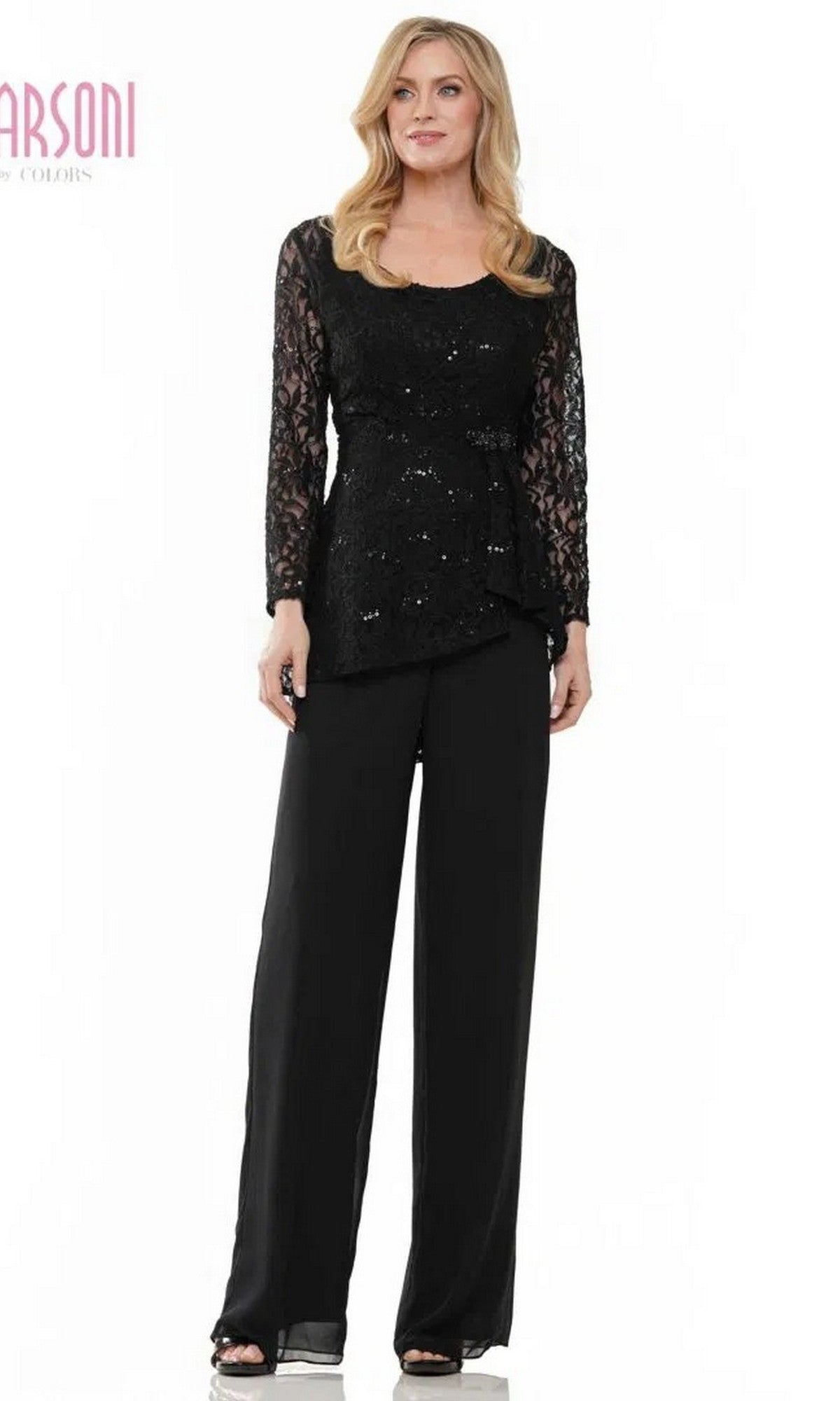A woman in the Marsoni M305 black long formal pantsuit, featuring a lace sequin jacket and wide-leg chiffon pants, stands against a white background.